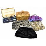 Four vintage handbags, a cased manicure set, and a gilt resin box.Additional InformationGeneral wear