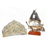 A circa 1900 Chinese white metal model junk (with stand and cased), unmarked, 13 x 11.5cm, and a