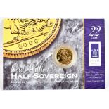 An Elizabeth II half sovereign, 2000, in card of issue.