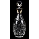 F G FLAVELL LTD; an Elizabeth II hallmarked silver collared clear cut glass decanter with stopper,
