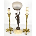 An early 20th century bronzed spelter figural table lamp modelled in the form of a semi-nude