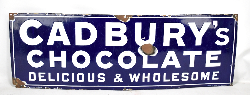 An original enamel advertising sign inscribed 'Cadbury's Chocolate, Delicious & Wholesome', 30 x