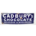 An original enamel advertising sign inscribed 'Cadbury's Chocolate, Delicious & Wholesome', 30 x