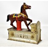 A painted cast iron 'Trick Pony' money box, stamped to base 'Pat'd June 2d and July 7th 1885', 19.