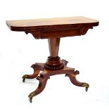 A good quality early 19th century rosewood crossbanded tea table, the hinged D-shaped top above