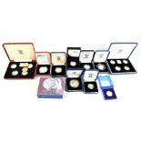 A group of boxed predominantly proof silver coinage including Victorian anniversary crown, £1 coins,