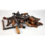 A collection of twenty-five assorted dining table winding handles.