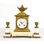 A late 19th century French gilt metal and alabaster three piece clock garniture, the circular floral