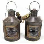 A pair of brass ships' lanterns, port and starboard, height including swing handle 34cm (2).