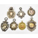 Seven pocket watch fobs to include a hallmarked silver Scarsdale Cup Joint Holders 1904 Football
