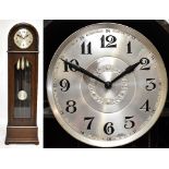An early 20th century oak cased three weight longcase clock, the silver planished dial set with