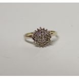 A 9ct yellow gold diamond cluster ring, size Q, approx 2.9g.