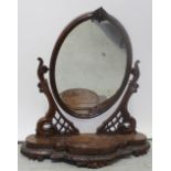 A Victorian walnut dressing table swing mirror,