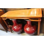 A Chinese hardwood altar-type side table, 77 x 107 x 38cm.