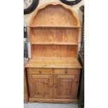 A contemporary Welsh dresser of small proportions,