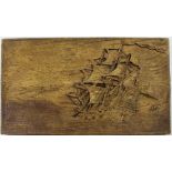 Chris Lovell; a wooden carving in relief depicting the ship 'Drommedaris' entering Table Bay,