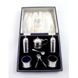 A George V hallmarked silver eight-piece cruet set, William Neale Ltd, Birmingham 1935,