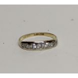 An 18ct yellow gold seven-stone platinum set diamond ring, approx 0.50 points, size N, approx 2.8g.