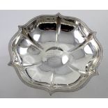 A George V hallmarked silver footed bowl with curved rim with Celtic design, Sheffield 1917,