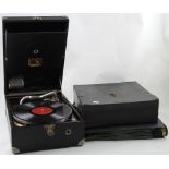 An early 20th century 'His Master's Voice' portable gramophone and a quantity of associated 78