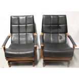 A pair of 1970s black leatherette and teak-framed rocking chairs with button-back upholstery (2).