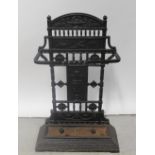 A Victorian cast iron stick/umbrella stand with twist front rail, height 85cm.