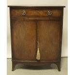 A mahogany and inlaid drinks cabinet.