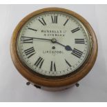 An early 20th century Russells Ltd Liverpool oak-cased station clock,
