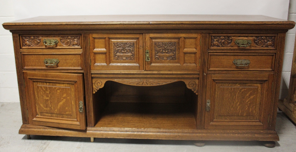 An early/mid-20th century oak sideboard,