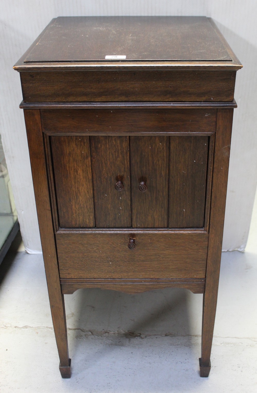 An early/mid-20th century oak Columbia music cabinet,