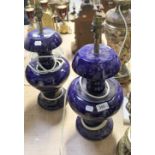 A pair of Royal Doulton cobalt blue baluster lamps to circular bases,