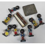 A group of eight Robinson's musician 'Golly' figures,