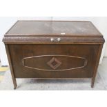 A c1930s oak blanket box with foliate and floral carved trim, 78 x 94cm,