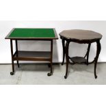 An Edwardian mahogany fold-over card table and a similar period circular occasional table (2).