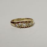 An 18ct yellow gold five-stone diamond ring, approx 0.30 pints, size L1/2, approx 2.6g.