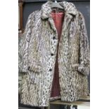 A vintage faux fur leopard print jacket.