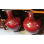 A large pair of Chinese sang de boeuf glazed vases with flared rims, unmarked, height 64cm,