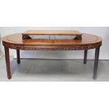 A Chinese hardwood dining suite comprising extending table with three drop-in leaves,