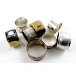 Three hallmarked silver napkin rings, combined approx 2ozt, three white metal napkin rings,