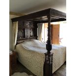 A bespoke Elizabethan-style king size four-poster bed,