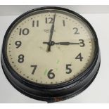 An early 20th century Smiths Sectric black metal station clock,