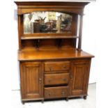 An early 20th century oak mirror-back sideboard,