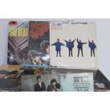 A collection of vinyl LPs to include The Beatles; 'Please Please Me' (x2), Sgt.