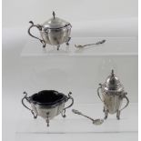 A George VI hallmarked silver three-piece cruet, salt, pepper pot, mustard with spoon,