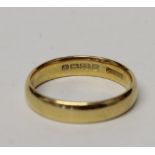 A 22ct yellow gold ladies' wedding band, size N1/2, approx 4.4g.