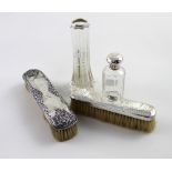 A hallmarked silver mounted clothes brush, Henry Matthews, Chester 1907,