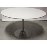 A c1960s Arkana Tulip dining table by Maurice Burke, raised on aluminium pedestal, marked to base,