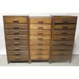 Three early/mid-20th century mahogany eight-drawer specimen chests to block supports,