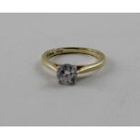 An 18ct yellow gold diamond solitaire ring, approx 0.65ct, size I, approx 2.4g.