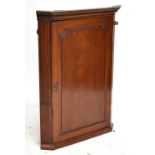 A 19th century mahogany flat fronted corner cupboard, height 97cm.